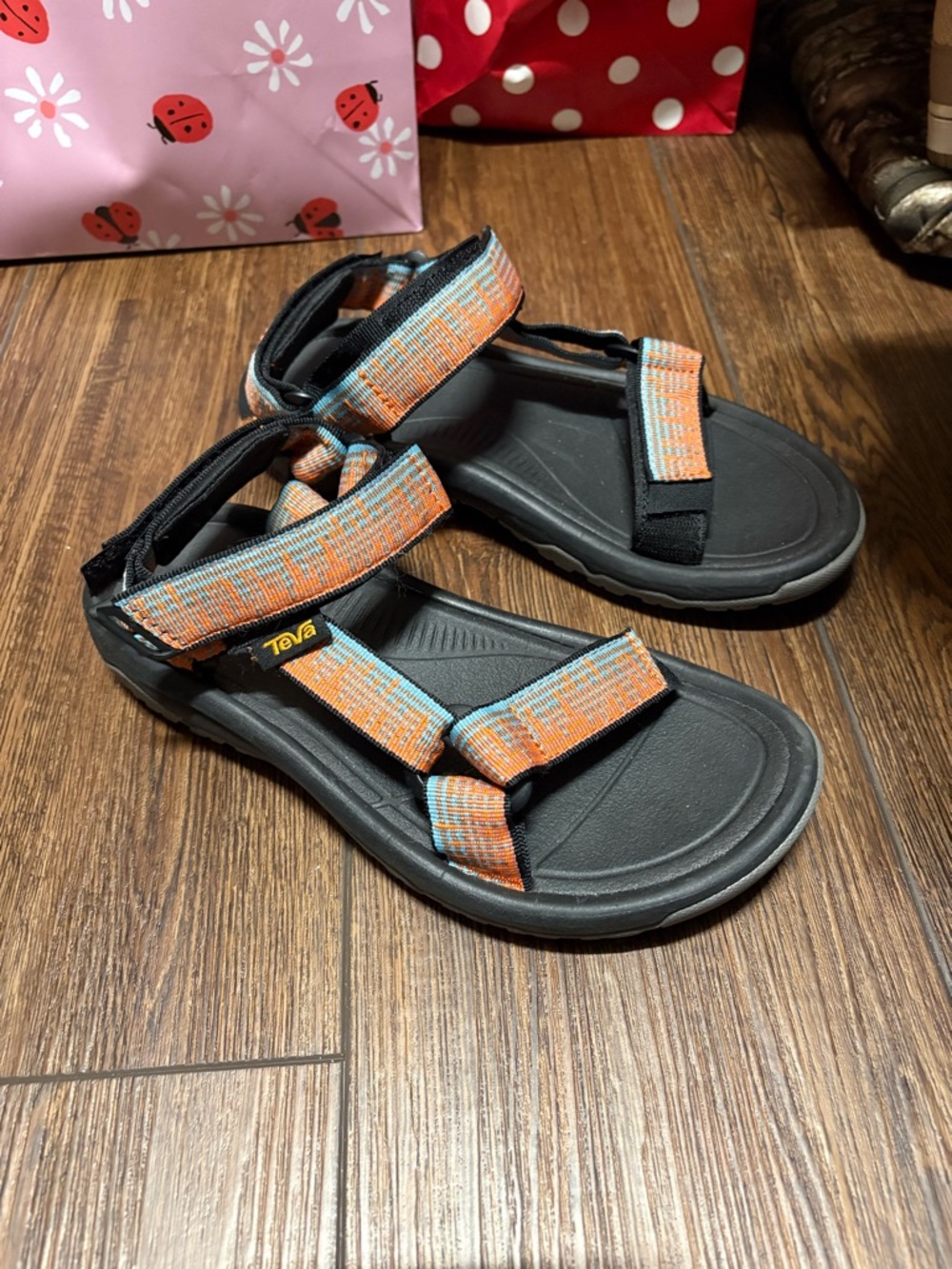 Tevas - worn once - coral and blue straps